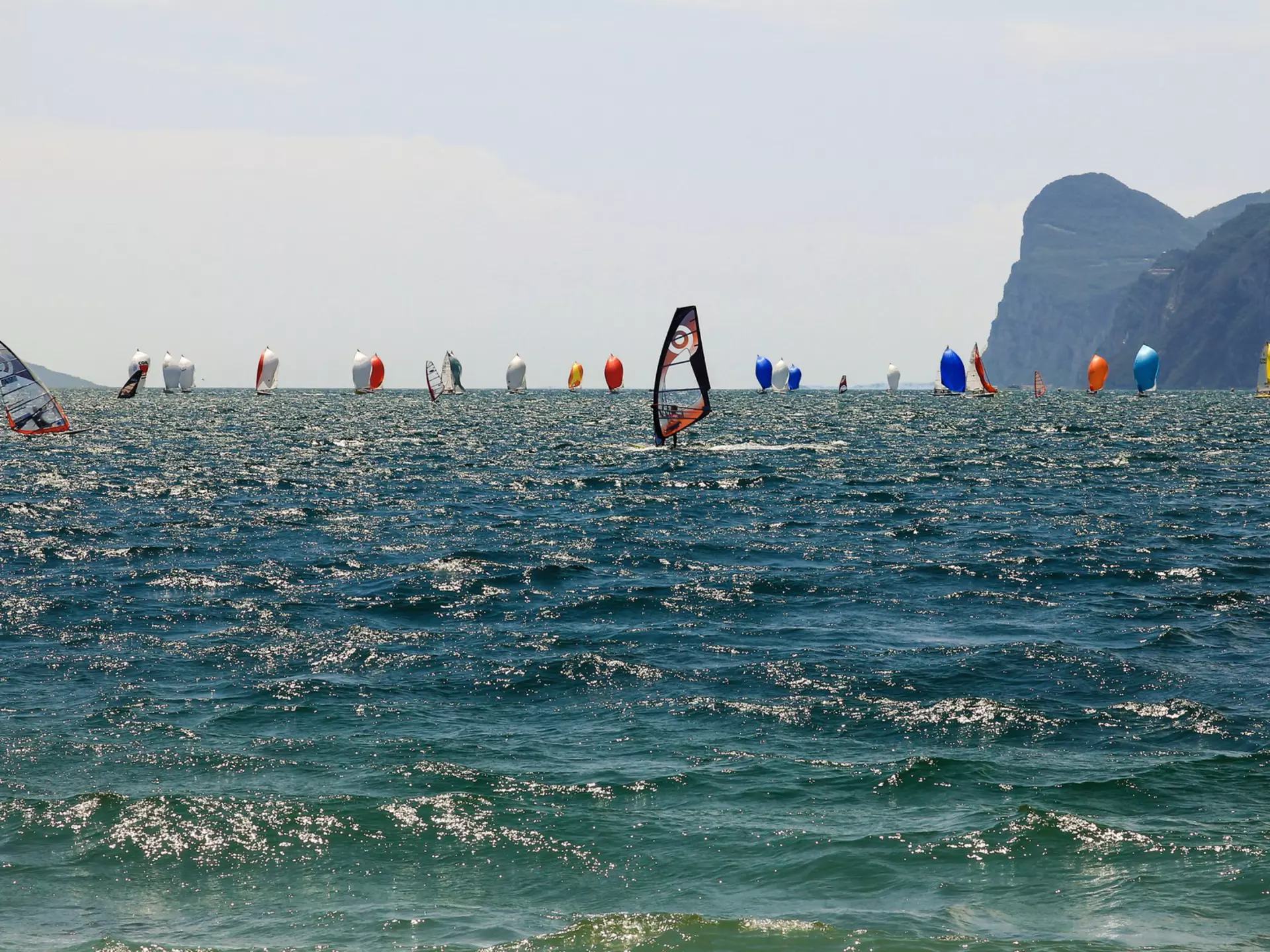 Windsurfers on Lake Garda. Drepicter / Getty Images.