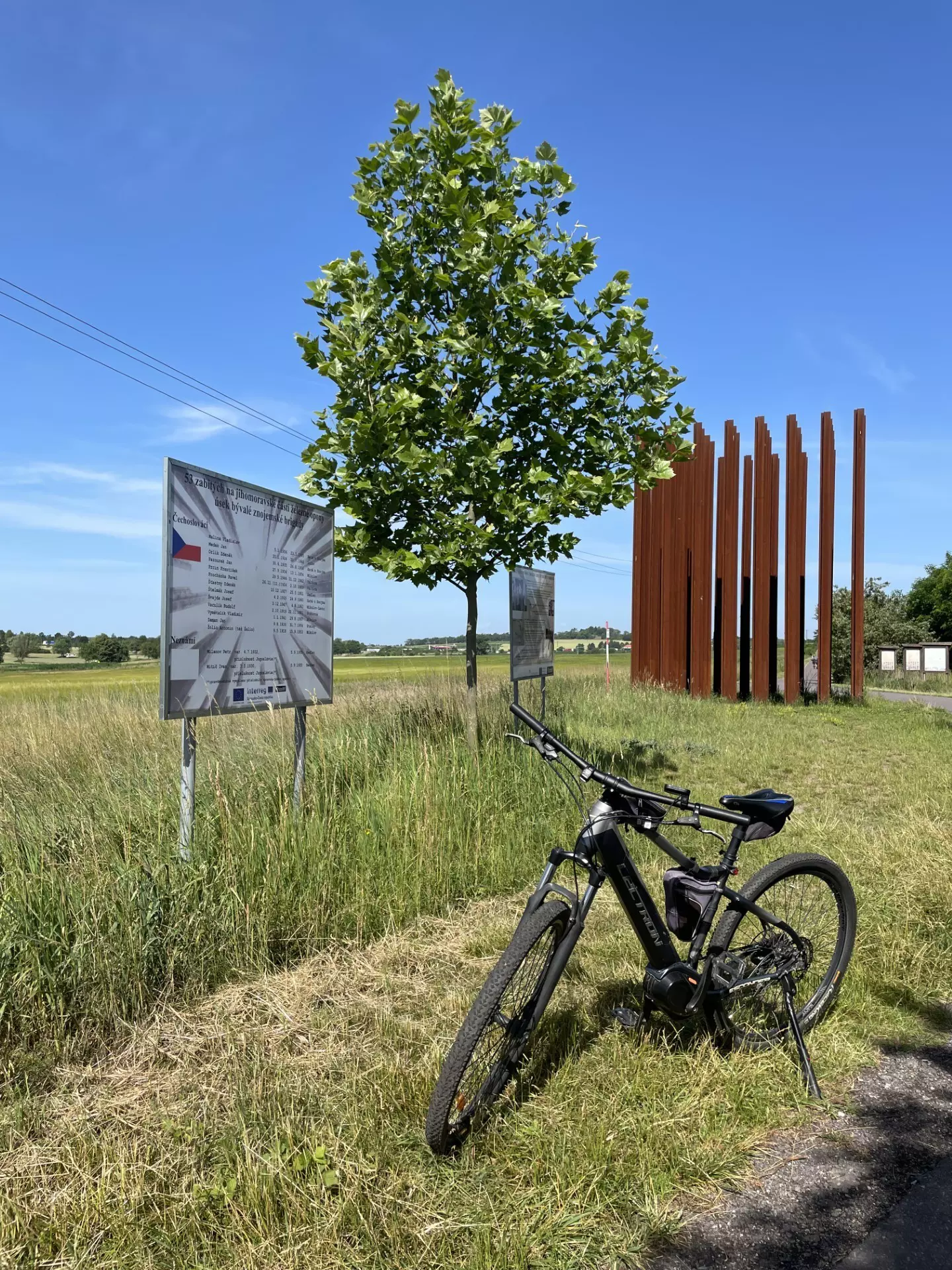 A bike parked beside a Cold War memorial along the EuroVelo 13 Iron Curtain Trail 