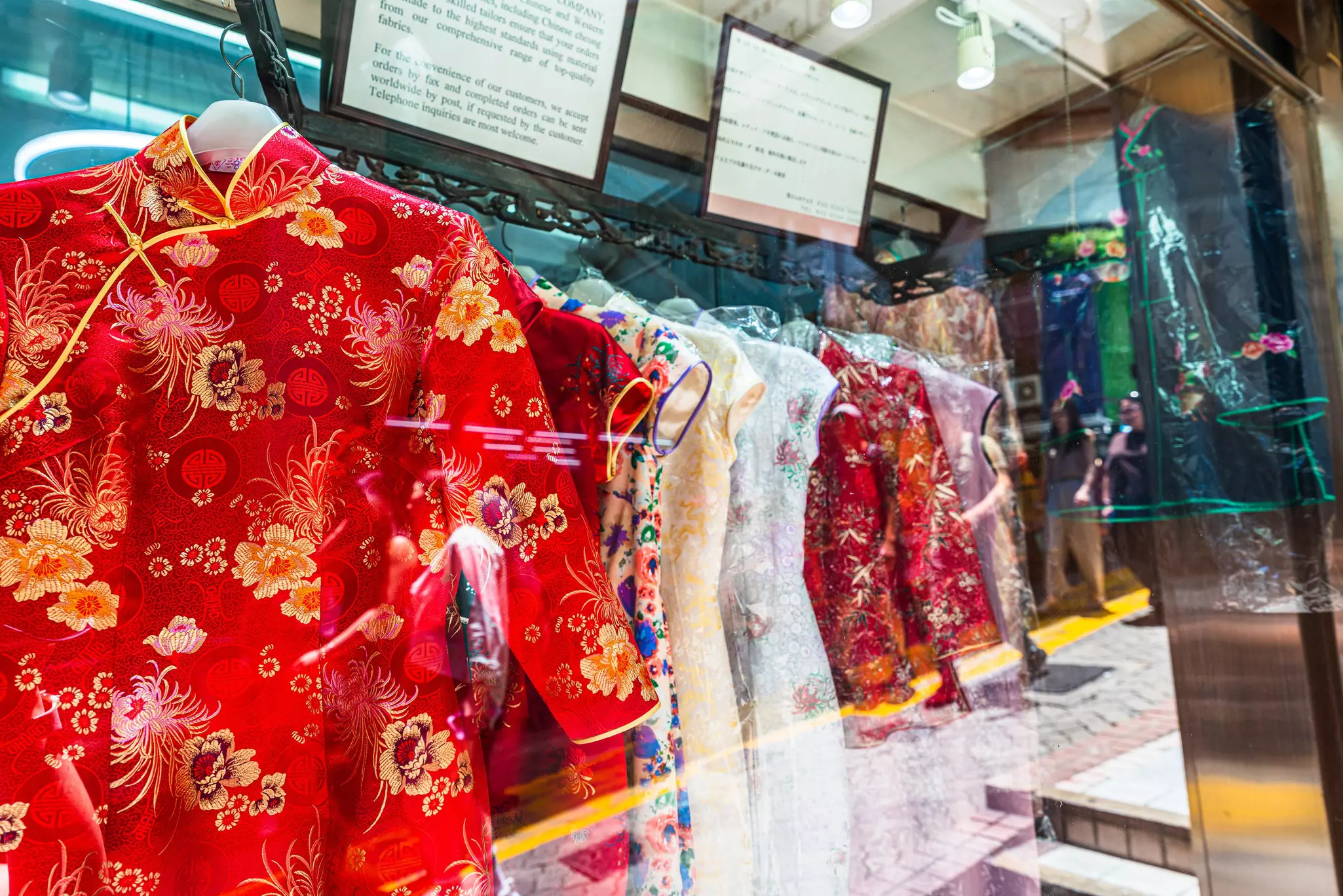 A rack of handmade dresses at a Hong Kong tailor. 