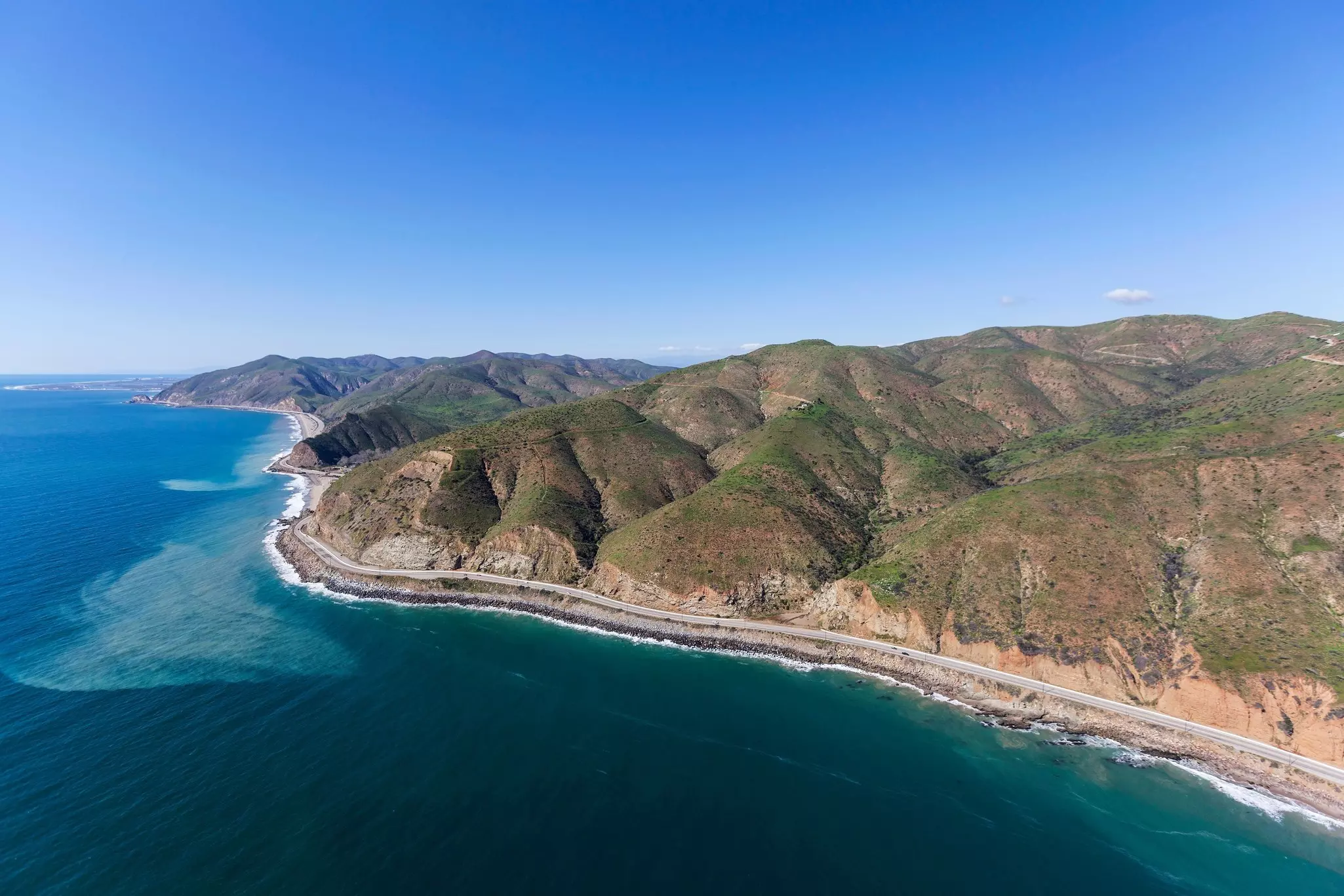 Aerial view of Pacific Coast Highway near Sycamore Cove north of Malibu California.