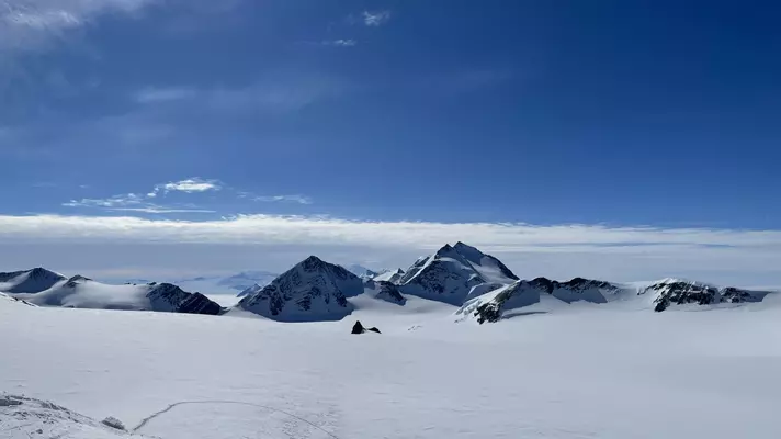 A mountain range covered in snow.