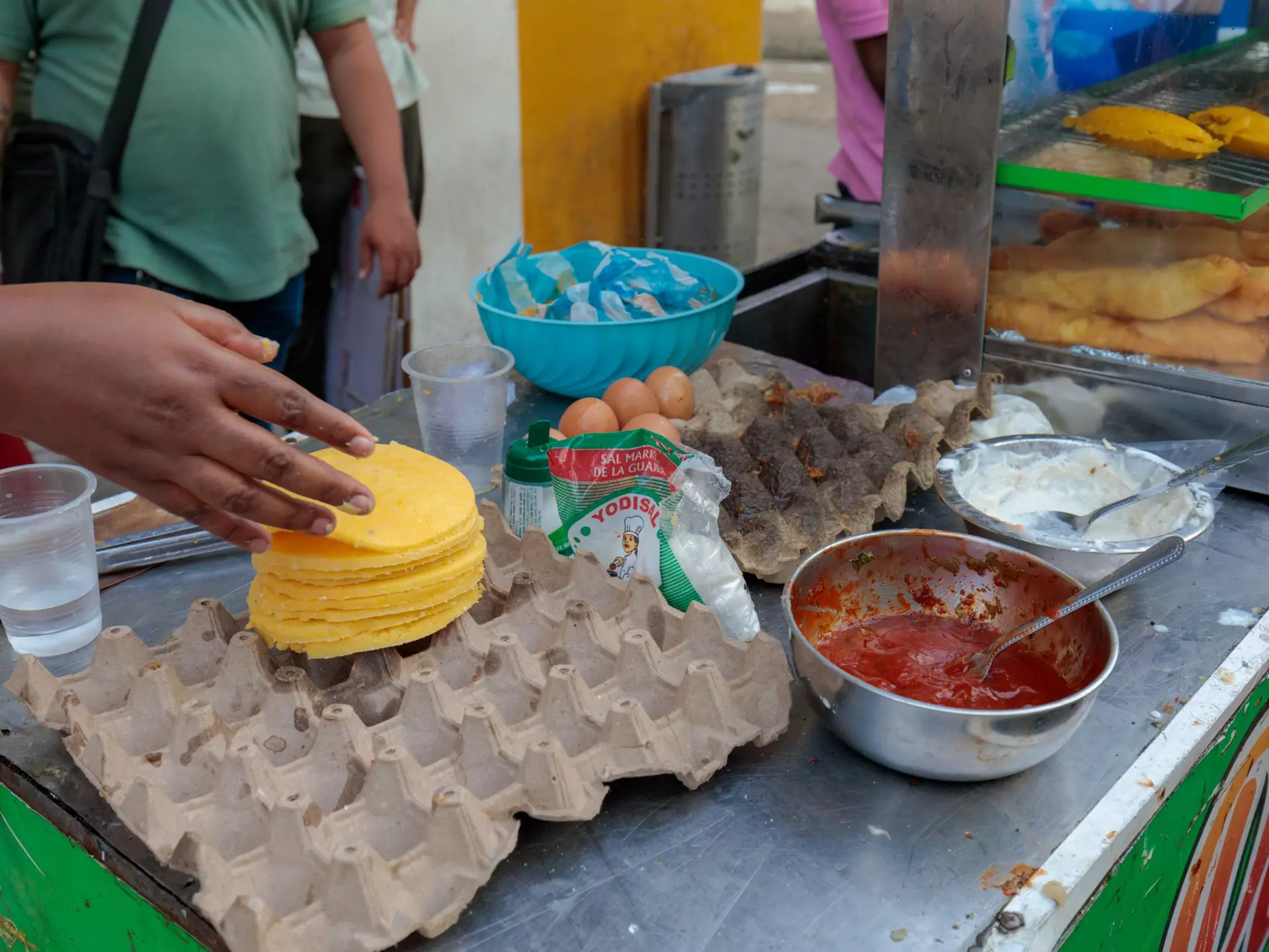 A person holding an empanada in Chile