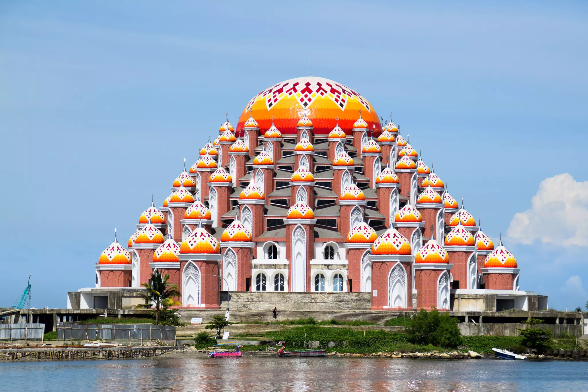 The colorful domes of the Asmaul Husnah 99 Kubah mosque in Makassar, Indonesia.