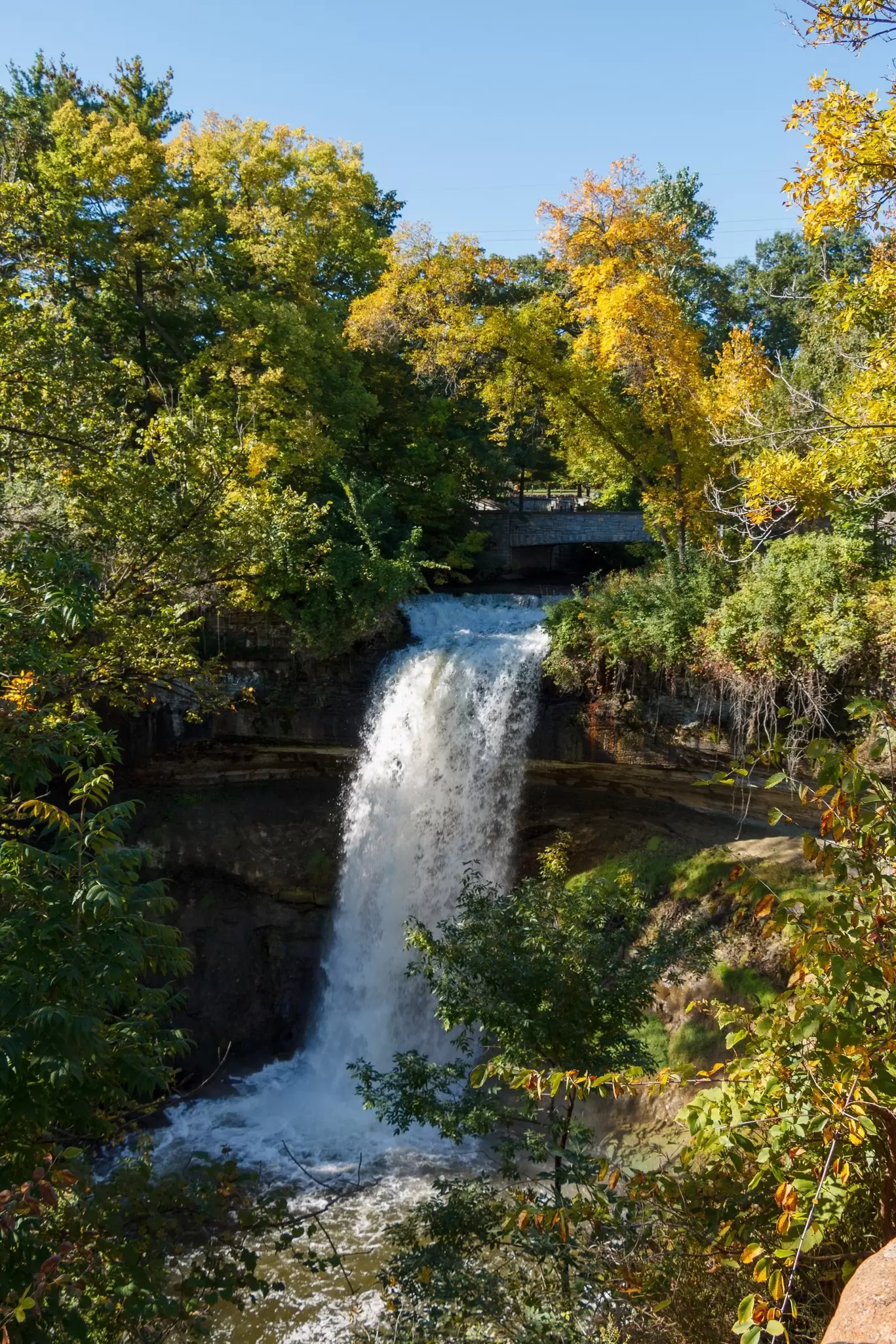 Minnehaha Falls tumbles through the forest on the edge of Minneapolis, Minnesota. 