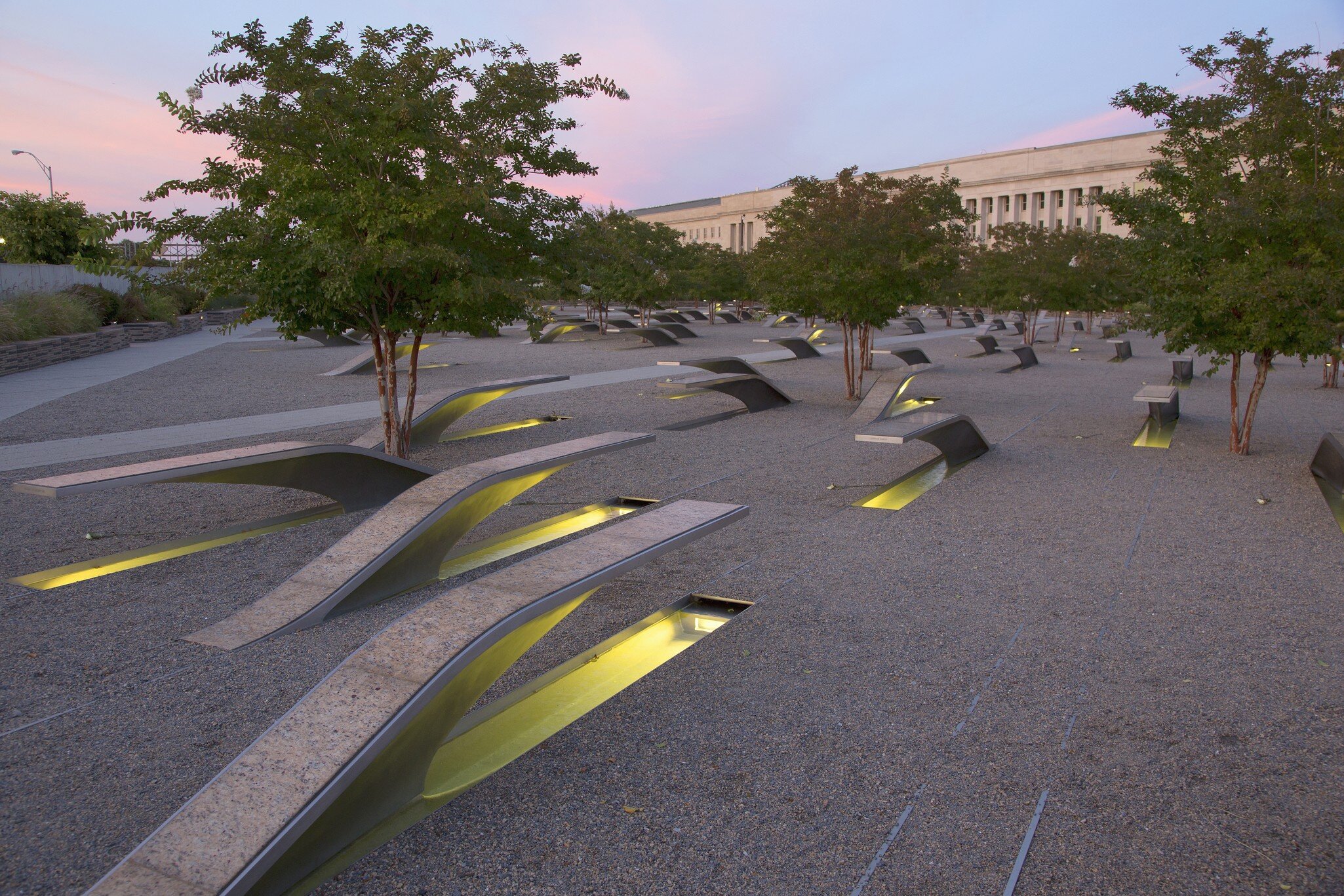 The Pentagon Memorial features 184 empty benches at sunset, a Memorial to commemorate the anniversary of the September 11, 2011 attacks, in Arlington VA., Washington, DC, USA. ; Shutterstock ID 166036523;