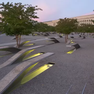 The Pentagon Memorial features 184 empty benches at sunset, a Memorial to commemorate the anniversary of the September 11, 2011 attacks, in Arlington VA., Washington, DC, USA. ; Shutterstock ID 166036523;