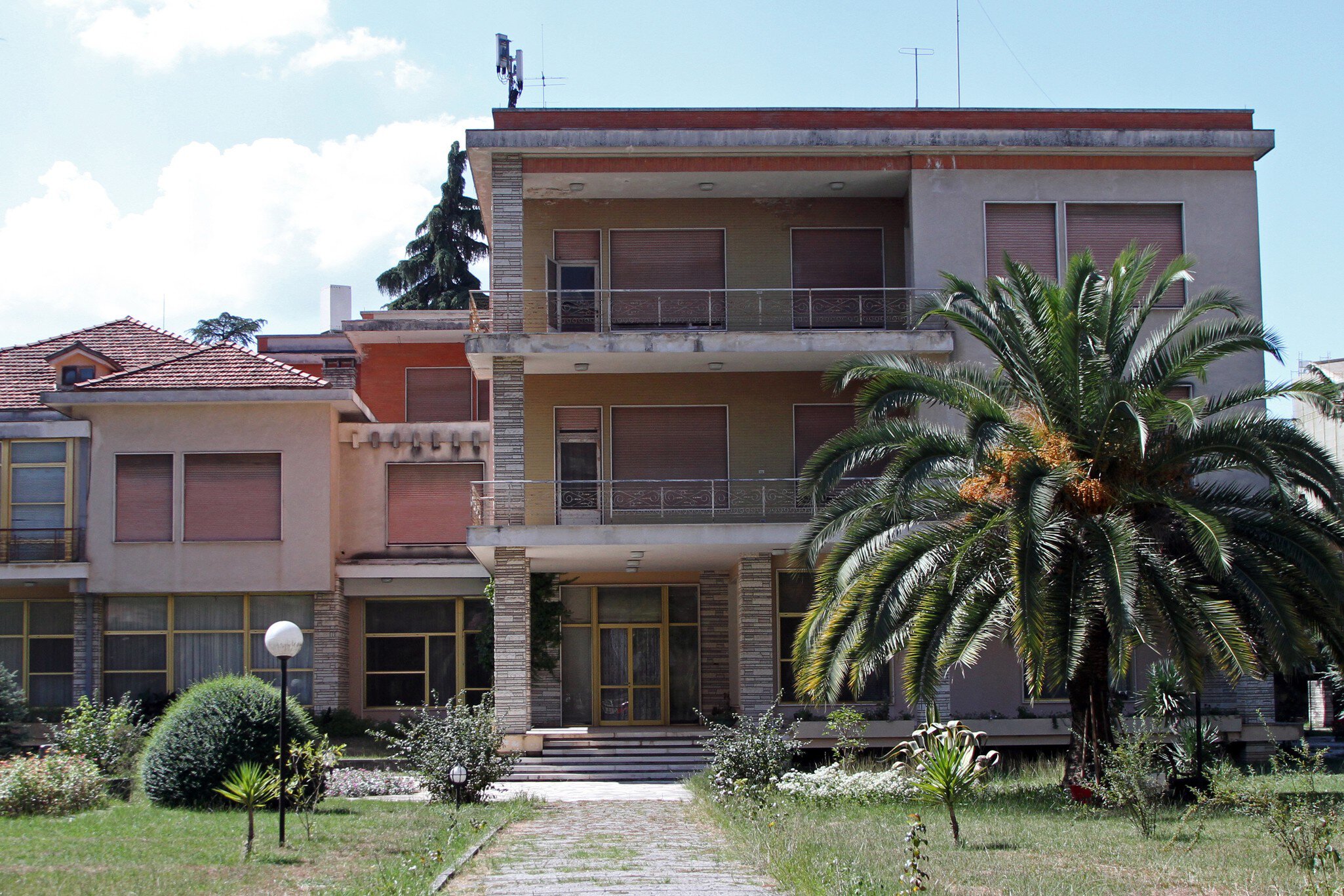 TIRANA, ALBANIA - 2013/09/06: Front of Enver Hoxha's former residence in Tirana, Albania. (Photo by Dominic Dudley/Pacific Press/LightRocket via Getty Images)