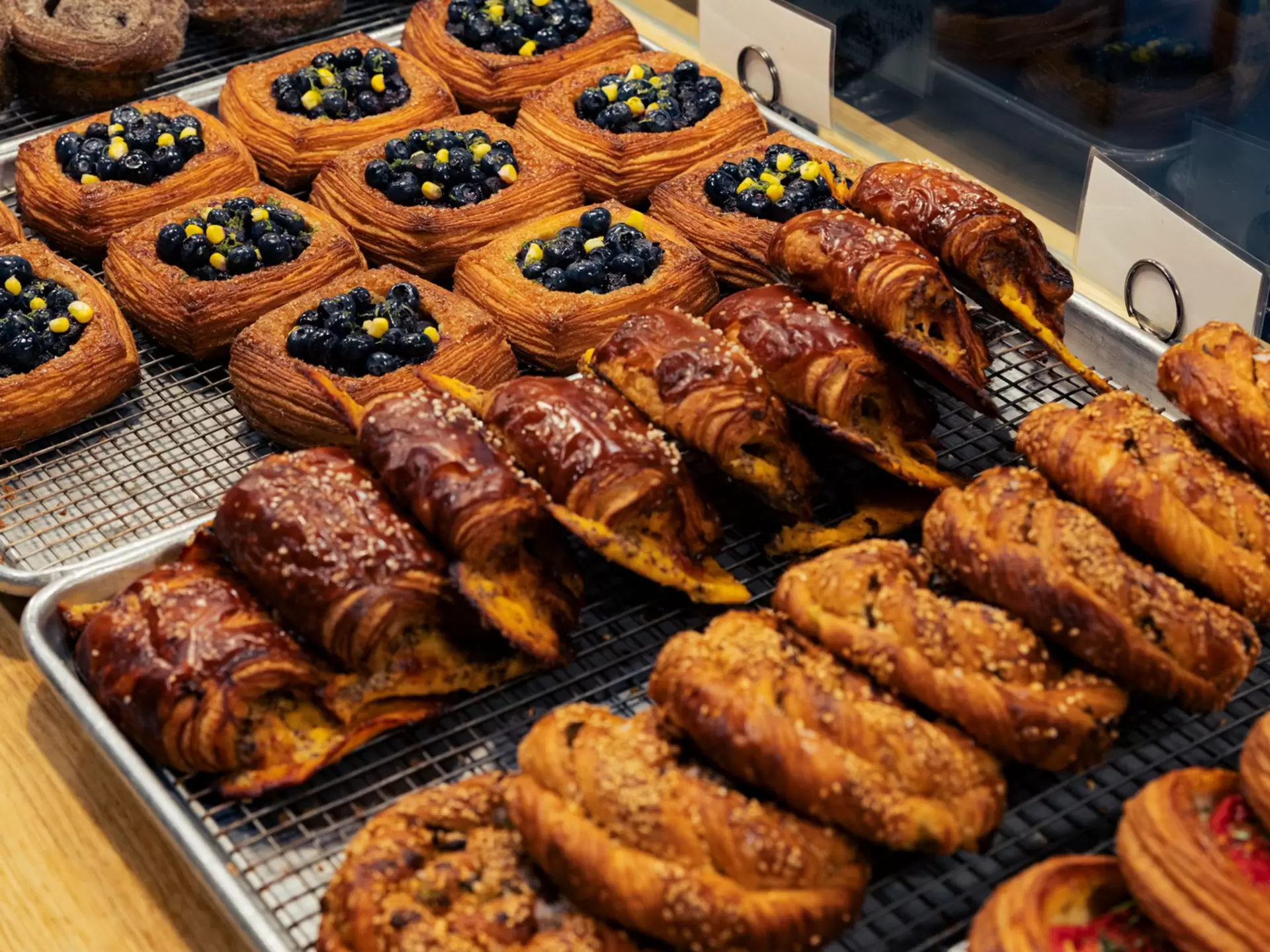 Brooklyn, New York July 5th -- Radio Bakery in Greenpoint, 135 India St, Brooklyn, NY 11222, info@radiobakery.nyc, Nina Subhas ninas@radiobakery.nyc, rows of pastries in display case