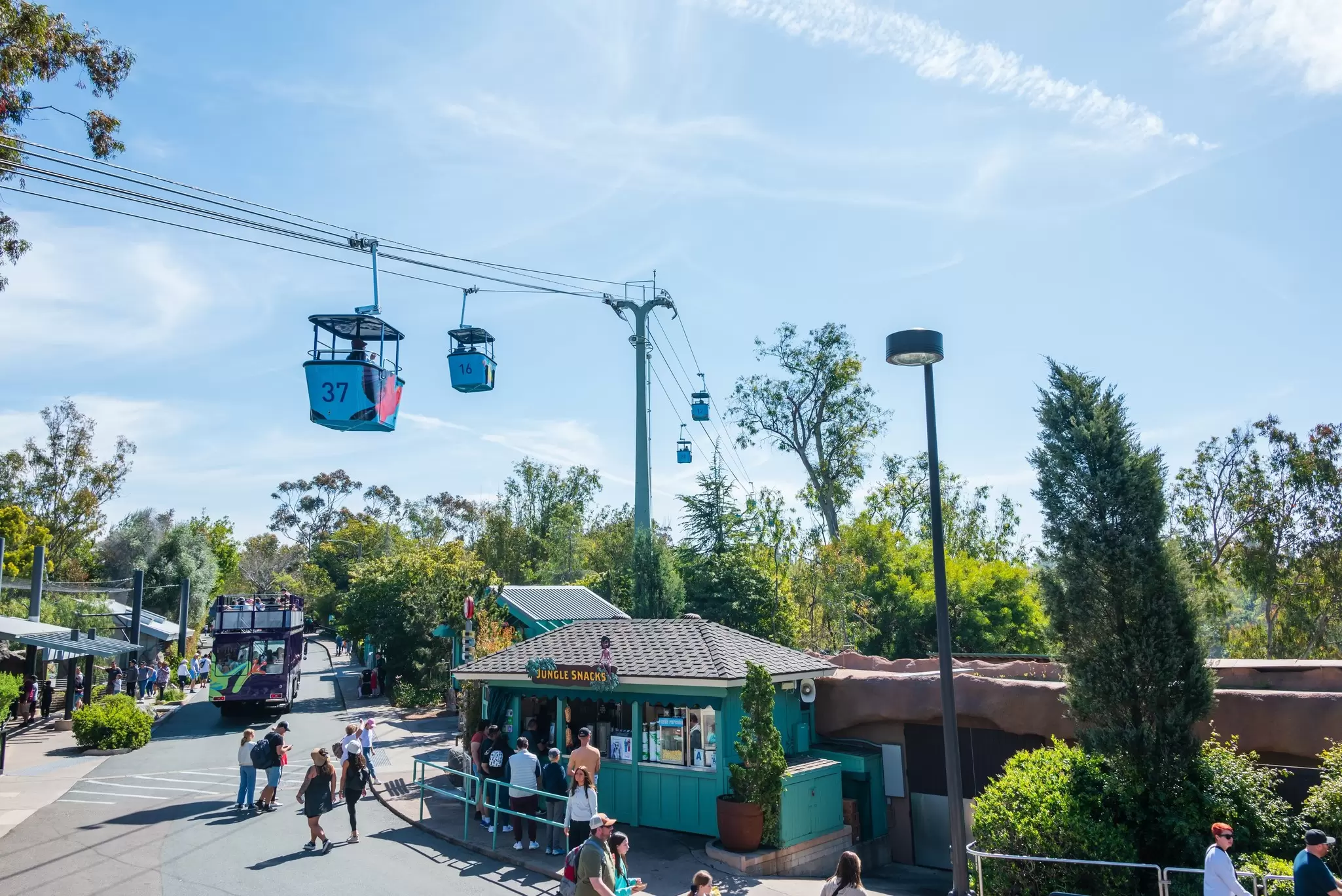 San Diego, CA USA - April 8, 2023: San Diego Zoo located in Balboa Park. Sky buckets with visitors exploring park., License Type: media, Download Time: 2025-02-07T15:01:50.000Z, User: Ppeterson948, Editorial: true, purchase_order: 56530 - Guidebooks, job: Global Publishing WIP, client: Global Publishing WIP, other: Pia Peterson Haggarty