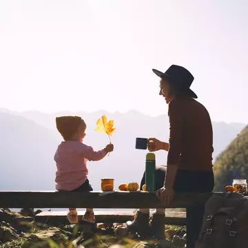 Happy family enjoying vacations in autumn time. Mother and daughter on a picnic in mountains. Mom and little child girl relaxing outdoors. Adventure travel with kids, camping and hiking in nature., License Type: media, Download Time: 2025-12-01T16:26:37.000Z, User: dermothegarty77, Editorial: false, purchase_order: 56530 - Guidebooks, job: Global Publishing WIP, client: Western Europe 16, other: Dermot Hegarty