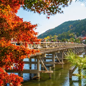 Fall colors next to Togetsukyo Bridge in the Arashiyama district in Kyoto.
