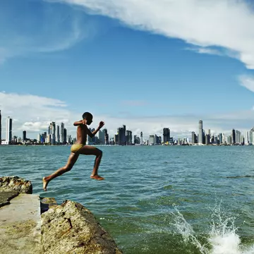 Boy jumping of rock into water in Casco Viejo bay with Panama City in background.
Lonely Planet Traveller Magazine, Issue 48, Panama, Pirates of the Caribbean