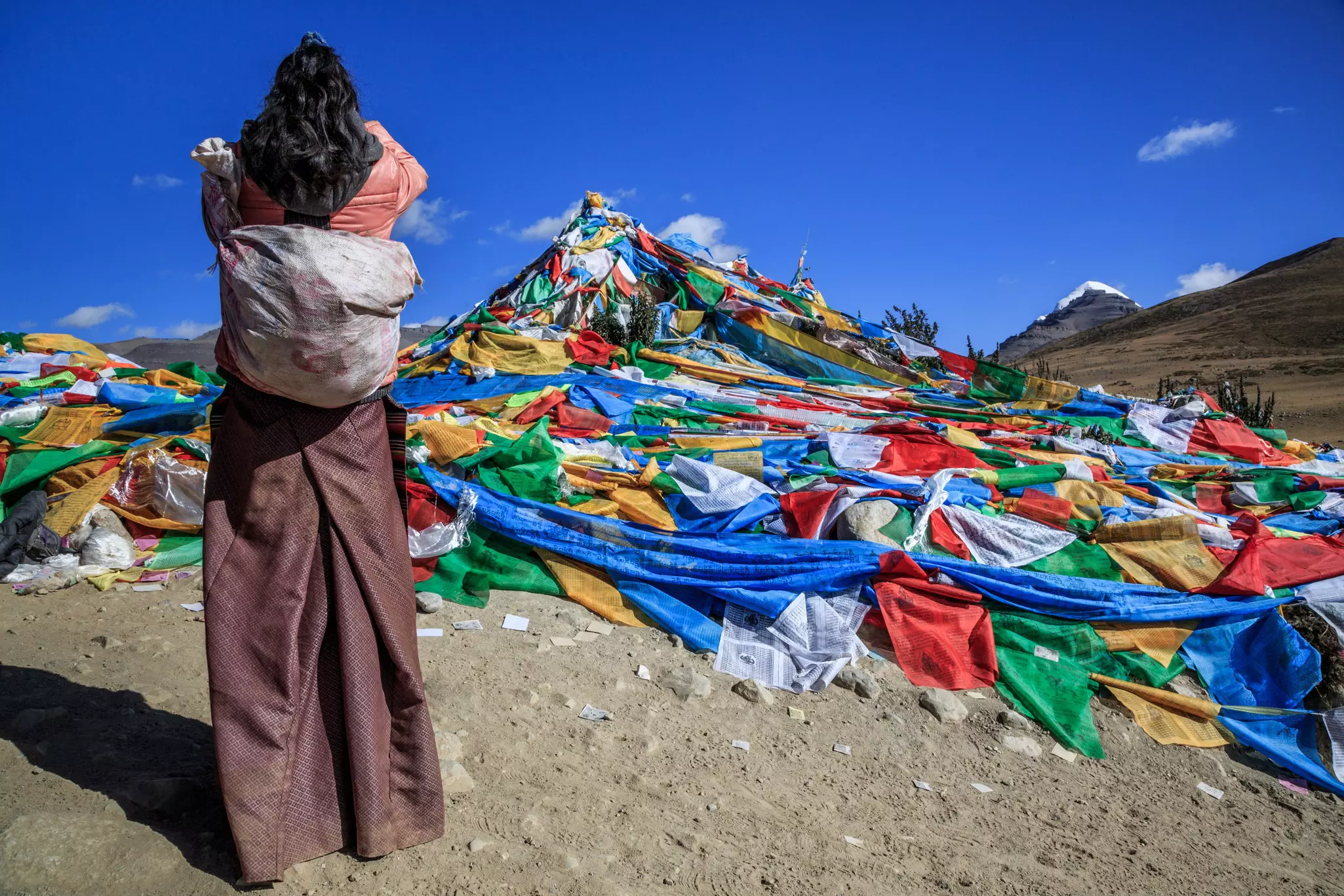 A pilgrim makes prayer. Feng Wei Photography / Getty
