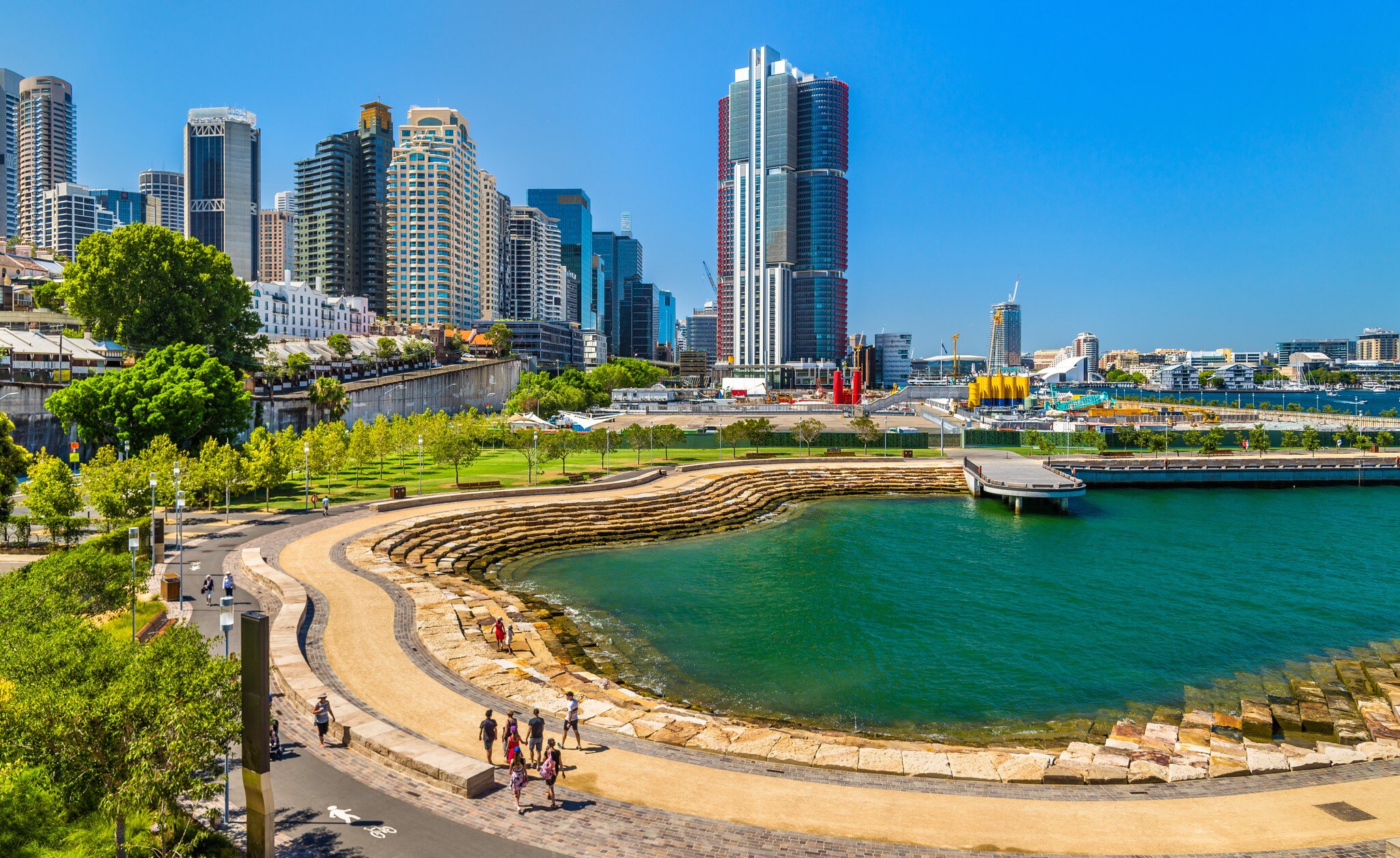 Aerial view of Barangaroo Reserve in Sydney, Australia. People walking with the skyline in the background.