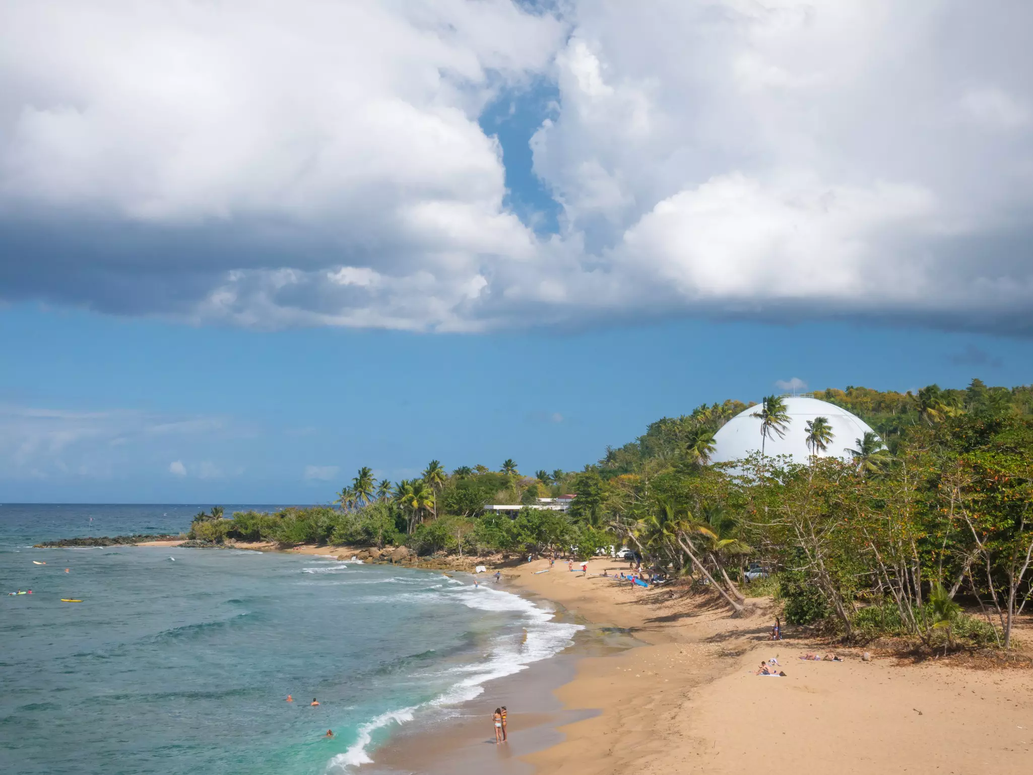 Domes Beach is on the northwest point of Puerto Rico, in Rincon and known for big wave surfing during the winter. Near the beach is a defunct nuclear facility.