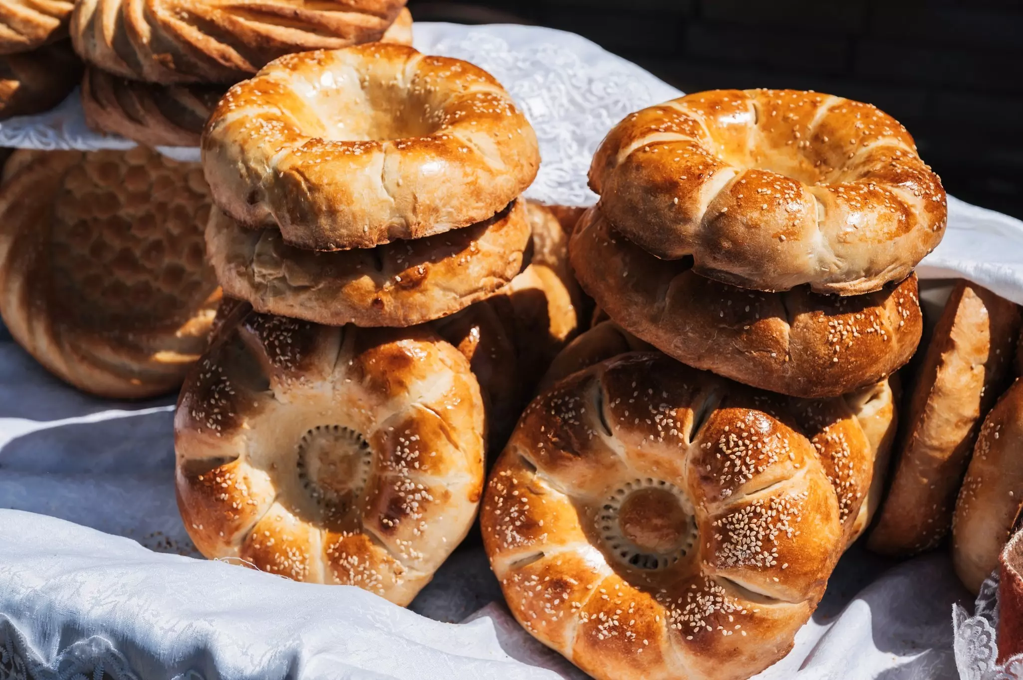 traditional Asian oriental bread Uzbek tandoor flatbread on the counter at the bazaar in Uzbekistan