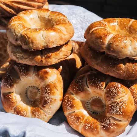traditional Asian oriental bread Uzbek tandoor flatbread on the counter at the bazaar in Uzbekistan