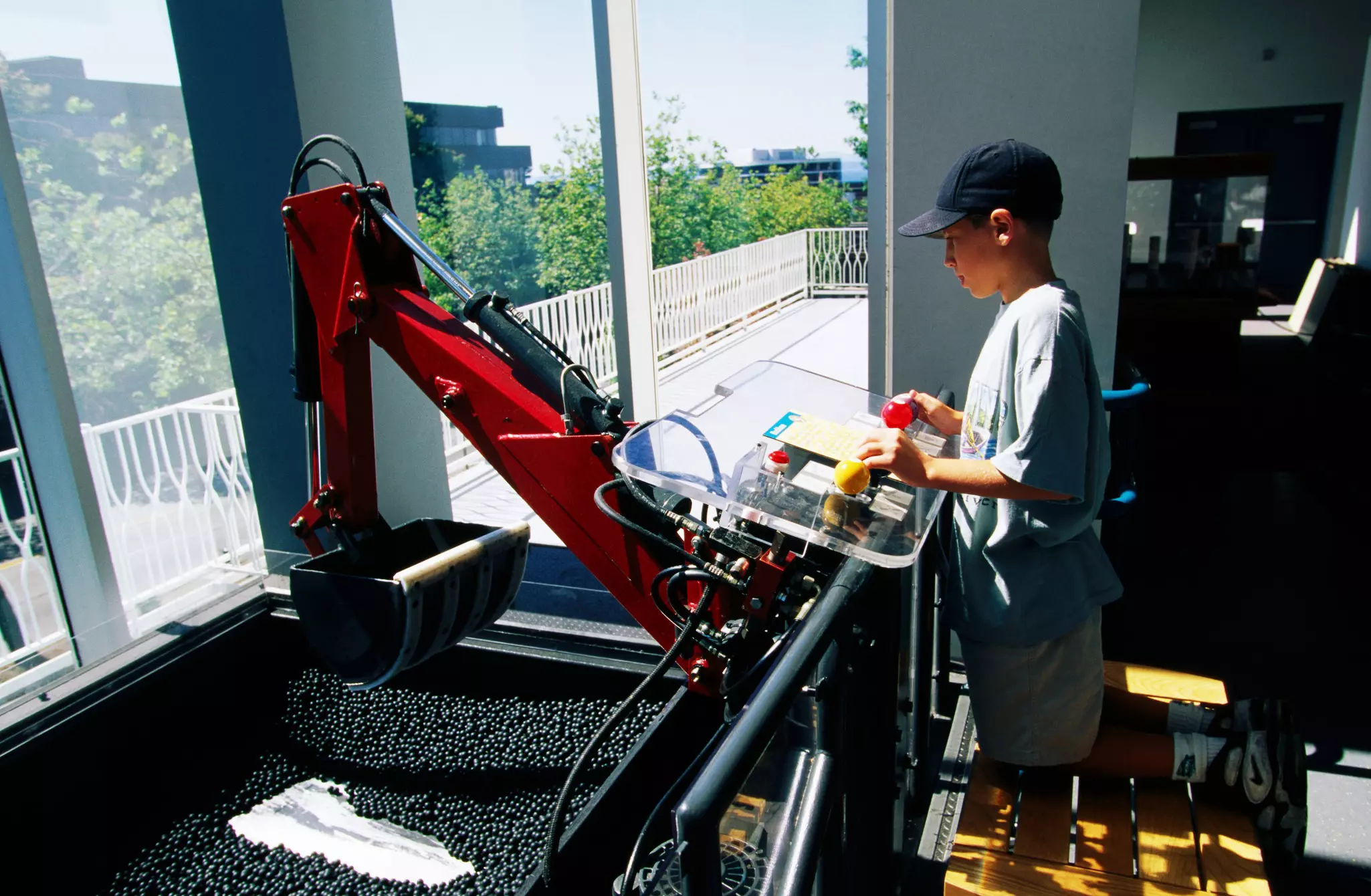 Boy on interactive exhibit at Pacific Science Center at Seattle Center, Seattle