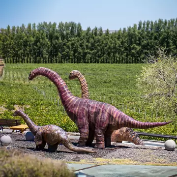 Dinosaur sculptures at the Bodega Familia Schroeder winery in Neuquén, Bariloche, Argentina. 