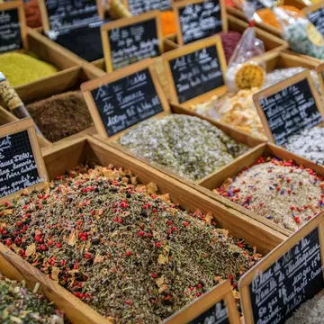Exotic flavored salts with herbs and spices for sale at a local covered provencal farmers market hall in old town or Vieil Antibes, South of France, License Type: media, Download Time: 2025-12-09T22:12:31.000Z, User: Norma.PrauseBrewer_LonelyPlanet, Editorial: false, purchase_order: 56530 - Guidebooks, job: Global Publishing WIP, client: Europe 5, other: Norma Brewer