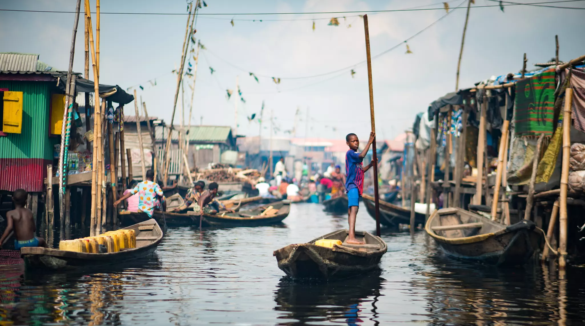 Part of the Badagry 'Slavery Route' hike requires trekkers to cross the lagoon at the Gberefu peninsula in a dugout canoe © Alucardion / Shutterstock