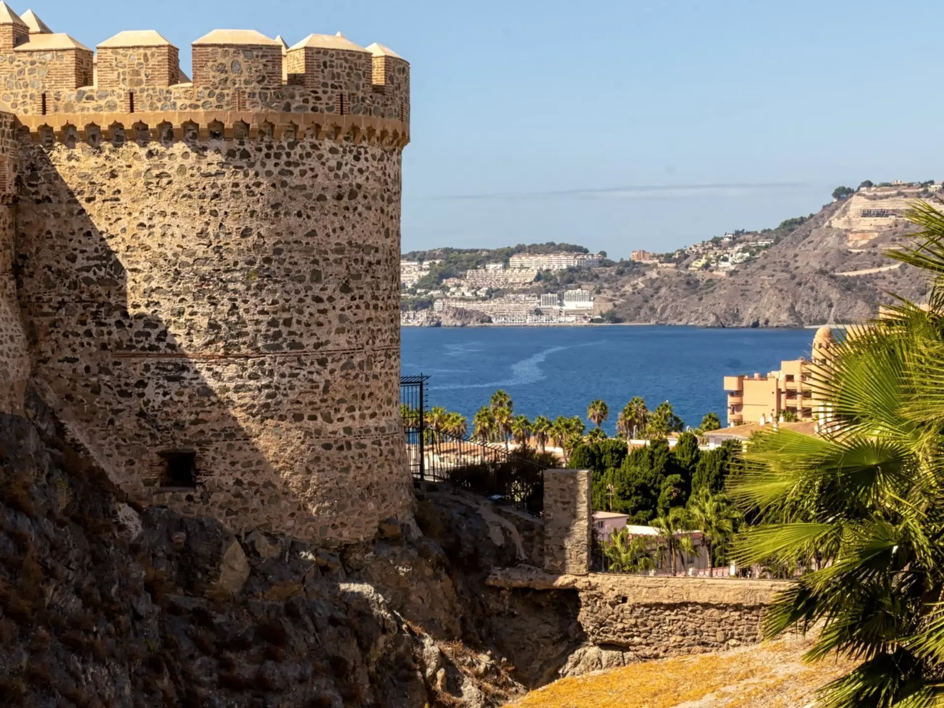 Castle of San Miguel in Almunecar, Granada, Spain, with the water in the background. 