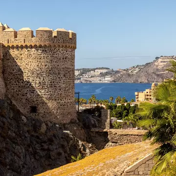 Castle of San Miguel in Almunecar, Granada, Spain, with the water in the background. 