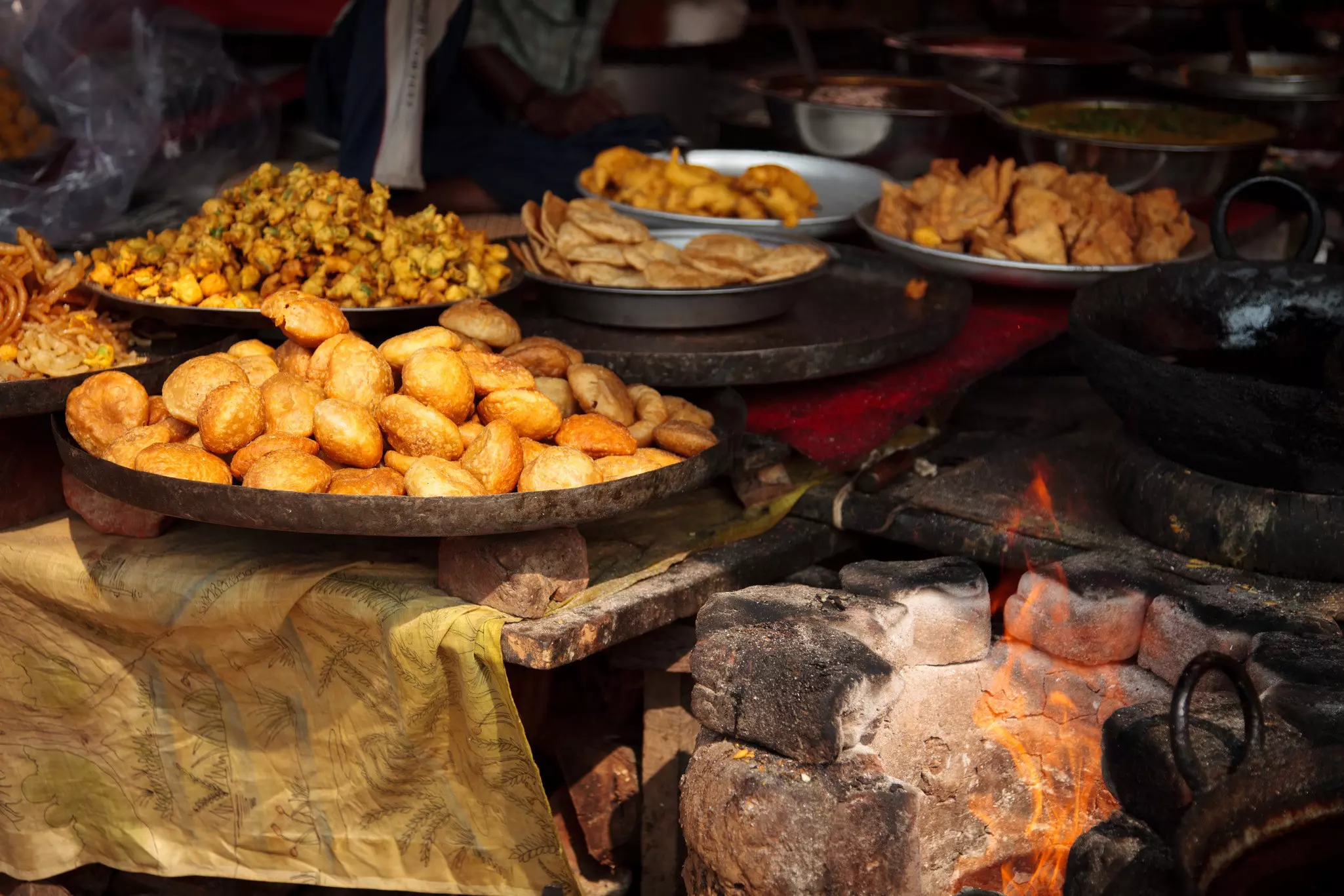 The famous kachori, pakoras and samosas at a street side in Jaipur, India. ©nullplus/Getty Images