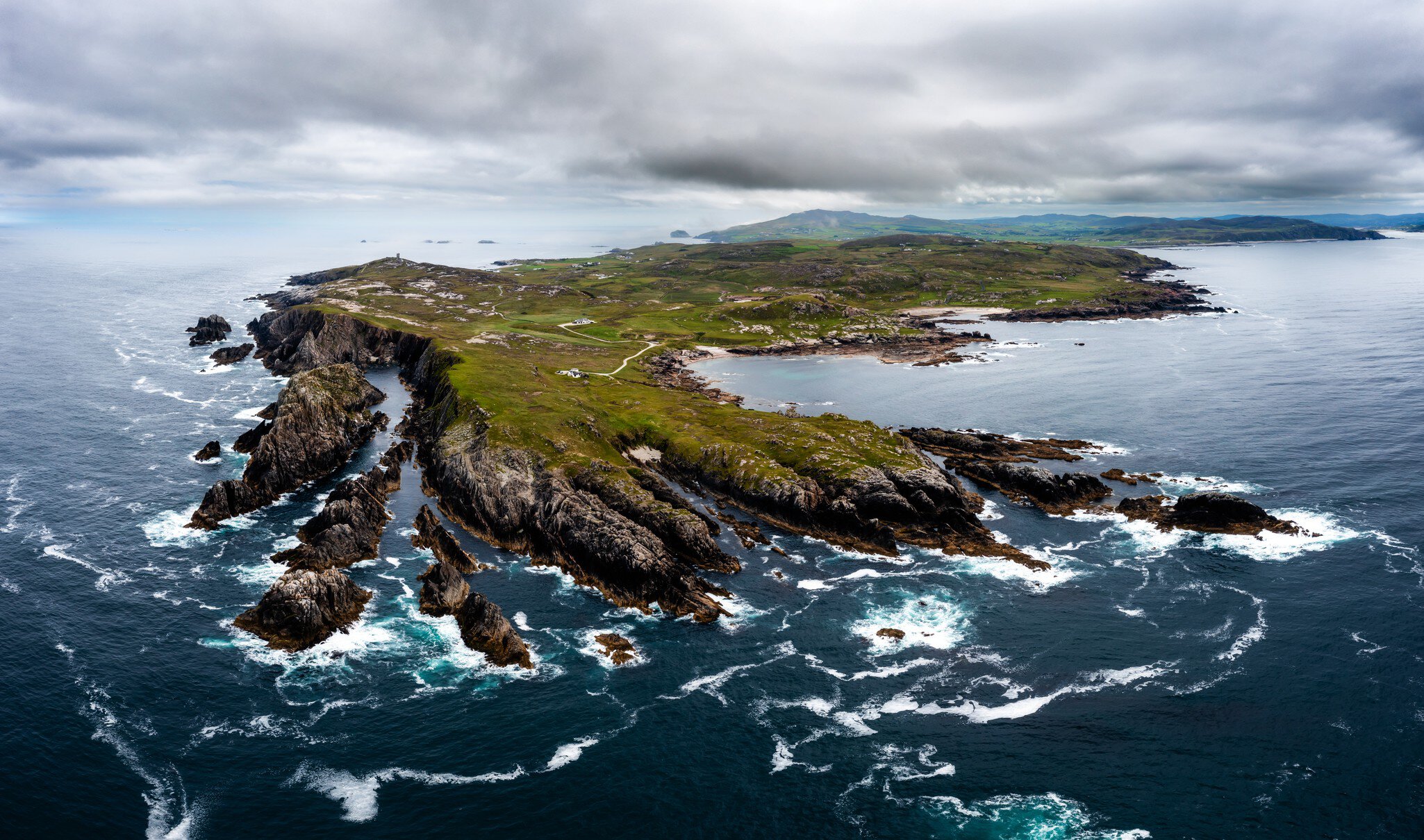 A panorama drone view of Malin Head and the northernmost point of Ireland
1408592156
ardmalin, atlantic, atlantic ocena, bird's eye view, drone view, dunalderagh, green, high angle, landscape, malin, most northerly point, northernmost point, ocena, panorama, panorama landscape, promontory, rocky, rugged, sightseeing
CLEARED FOR DIGITAL USE ONLY -