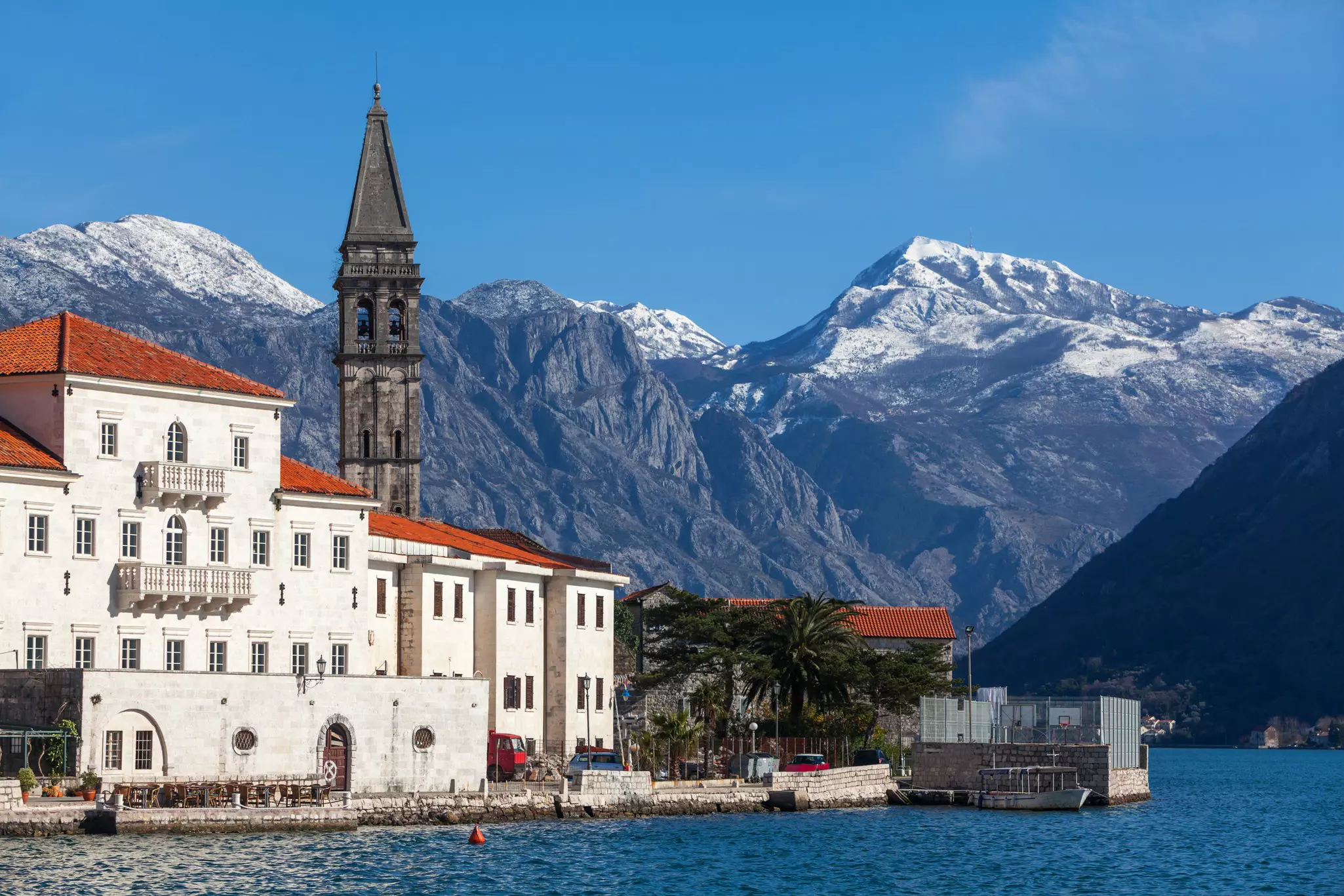 The town of Perast, framed by mountains on the Bay of Kotor.