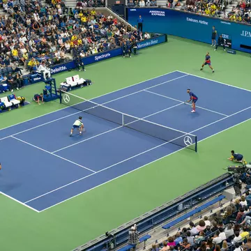 Catch all the US Open tennis action at the Billie Jean King National Tennis Center in New York City. lev radin/Shutterstock