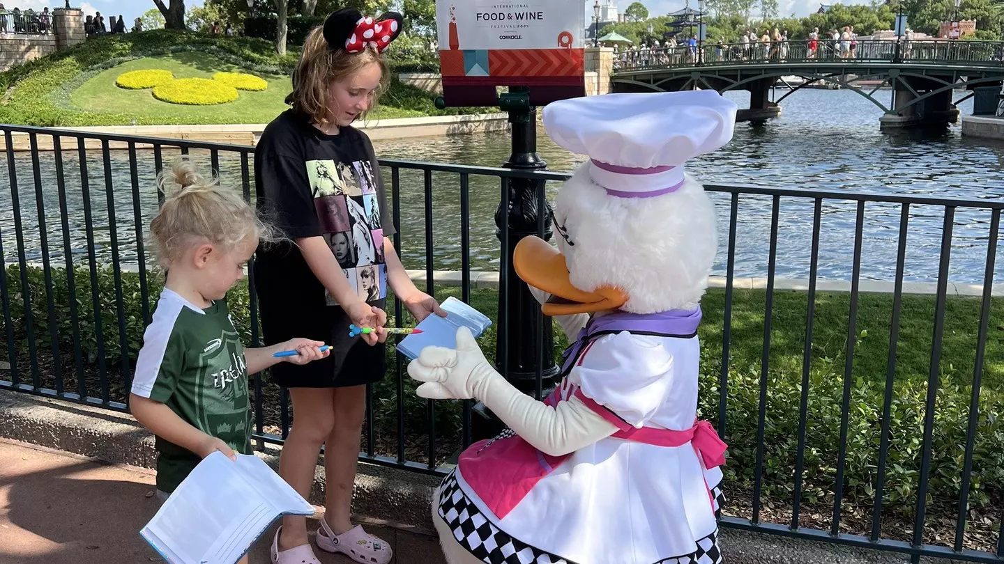 Freya and Phelan Stocking with Daisy Duck at Disney World