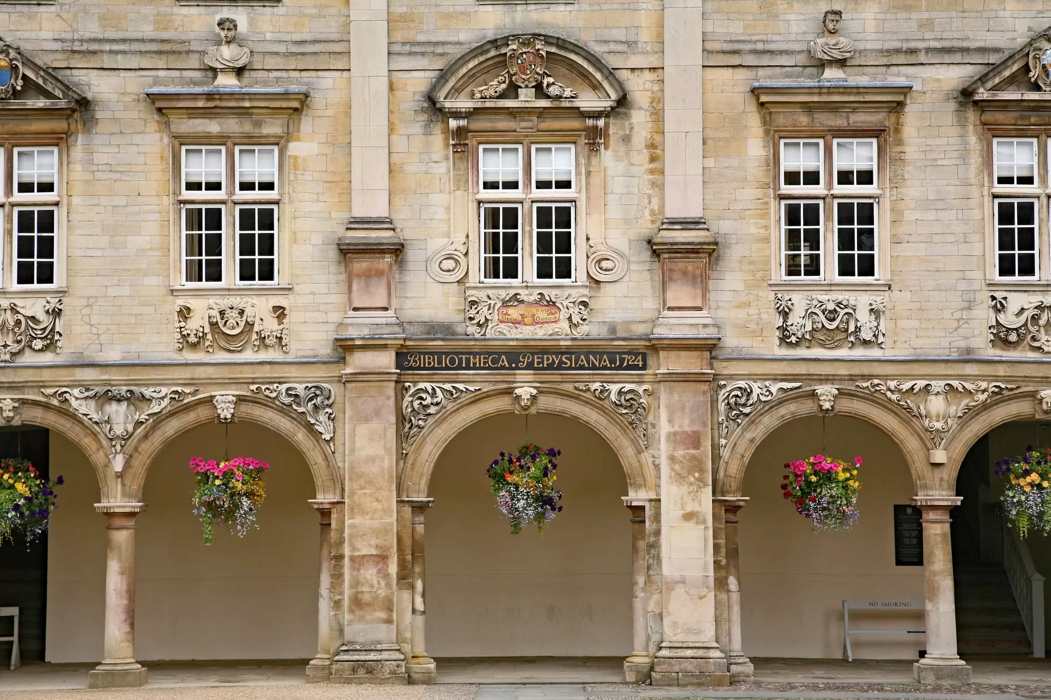 View of the ornate entrance to the Pepys Library building at Magdalene College, Cambridge University, UK.