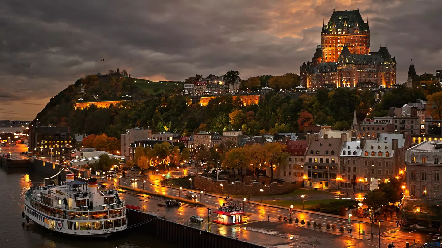 Quebec City after the rain at dusk with view of Le Chateau Frontenac on top of the hill.