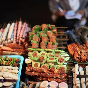 Variety of local food at a stall in Sapa, Vietnam.
