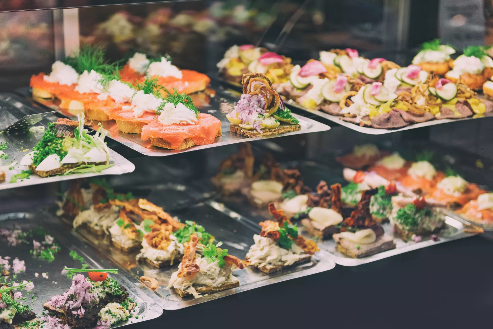 Dine like a local on a Danish smørrebrød (a traditional open sandwich) at a Copenhagen food market © Maridav / Shutterstock