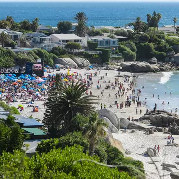 Cape Town - February 14, 2015:  aerial view or looking down onto Clifton 4th beach filled to capacity with people or beachgoers on Valentines day for a special open air concert event; Shutterstock ID 1512645083;