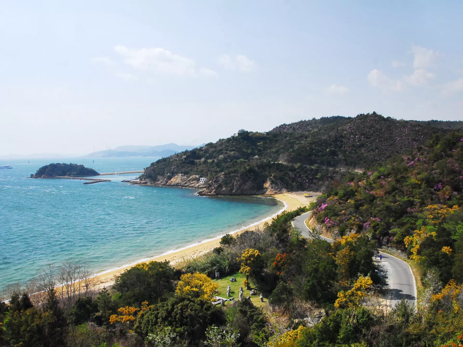 The beach surrounded by forest on Naoshima Island