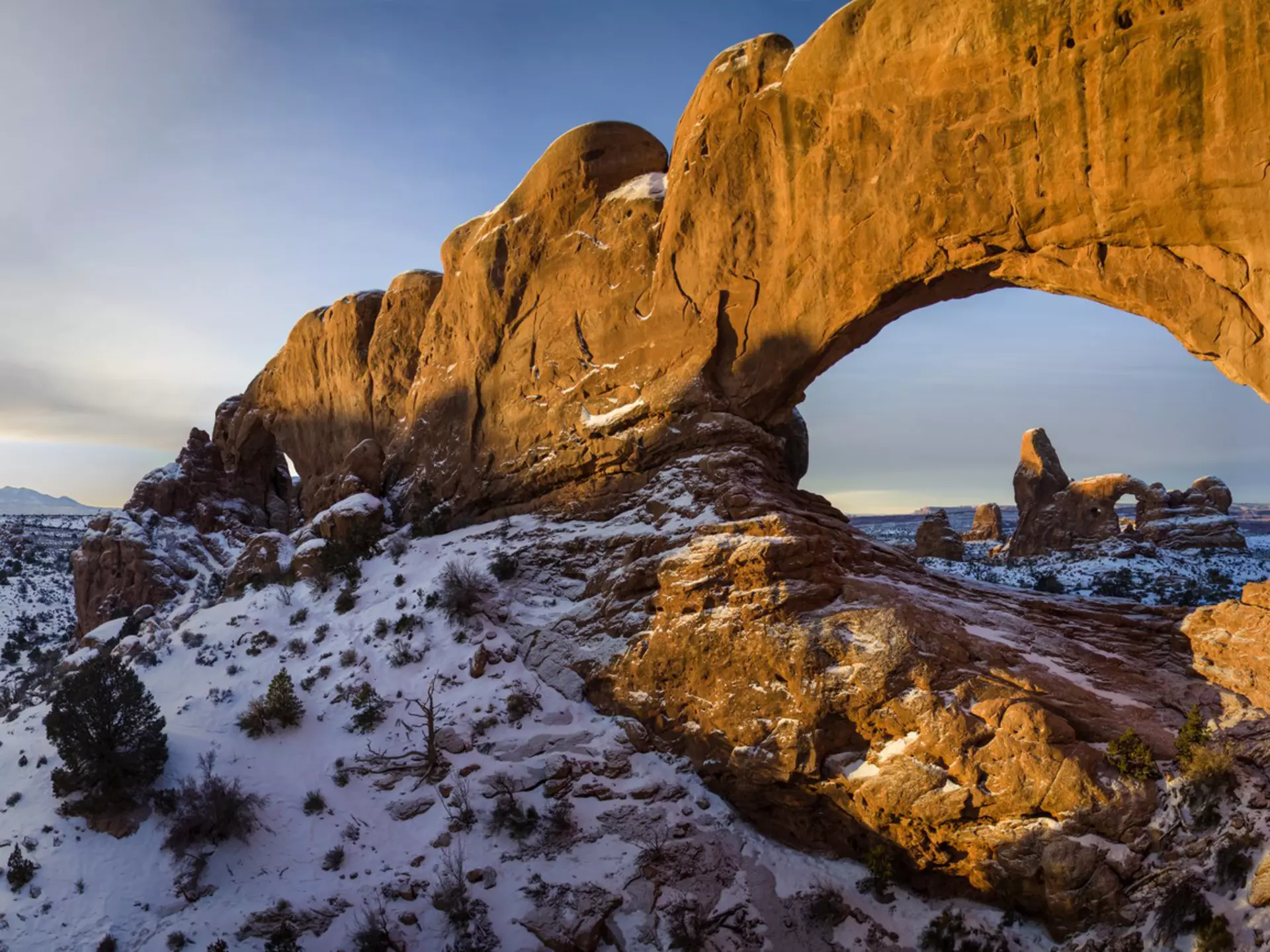 Turret arch thru North Window
Tranquil Scene Nature Travel Destinations Horizontal Panoramic Outdoors Plant USA Sky Cloud - Sky Rock Formation Rock - Object Day Snow Natural Arch Utah Arches National Park Sunlight Scenics Physical Geography Color Image...