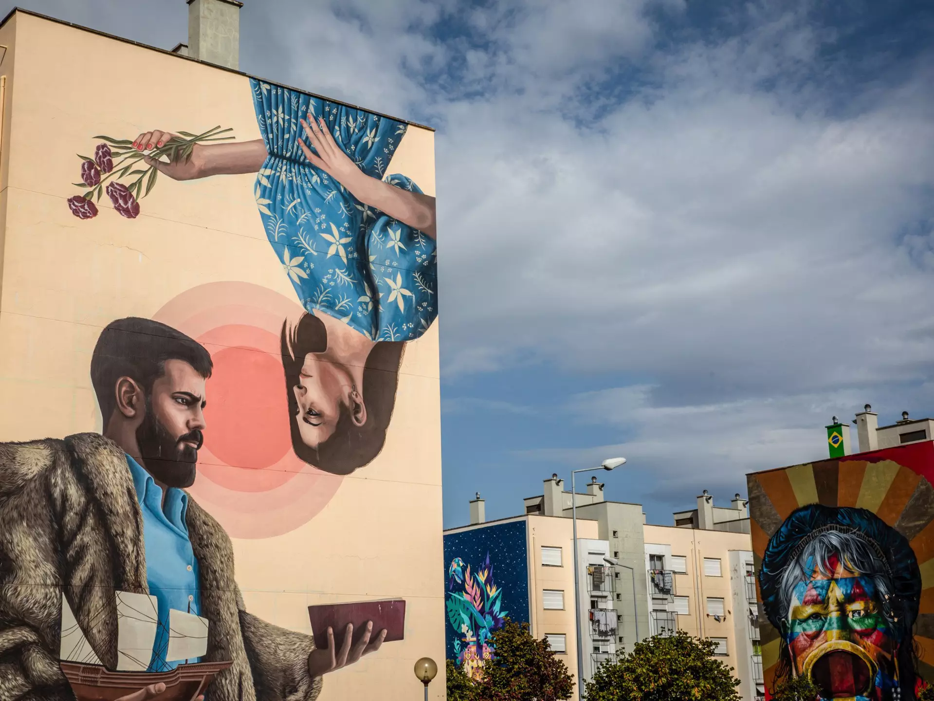 Murals adorn the walls of apartment blocks in the Marvila neighborhood of Lisbon. Bloomberg/Getty Images