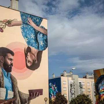 Murals adorn the walls of apartment blocks in the Marvila neighborhood of Lisbon. Bloomberg/Getty Images