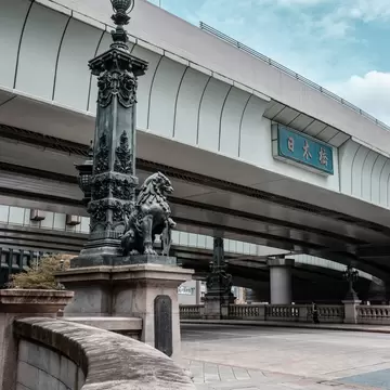 Tokyo, Japan - 05.2022: Nihonbashi Bridge with lion statue, one of the most historic bridge in Japan since Meiji era. One of the most popular tourist destinations in Tokyo metropolitan area.  License Type: media  Download Time: 2024-05-28T14:31:56.000Z  User: aniabartoszek  Is Editorial: Yes  purchase_order:   