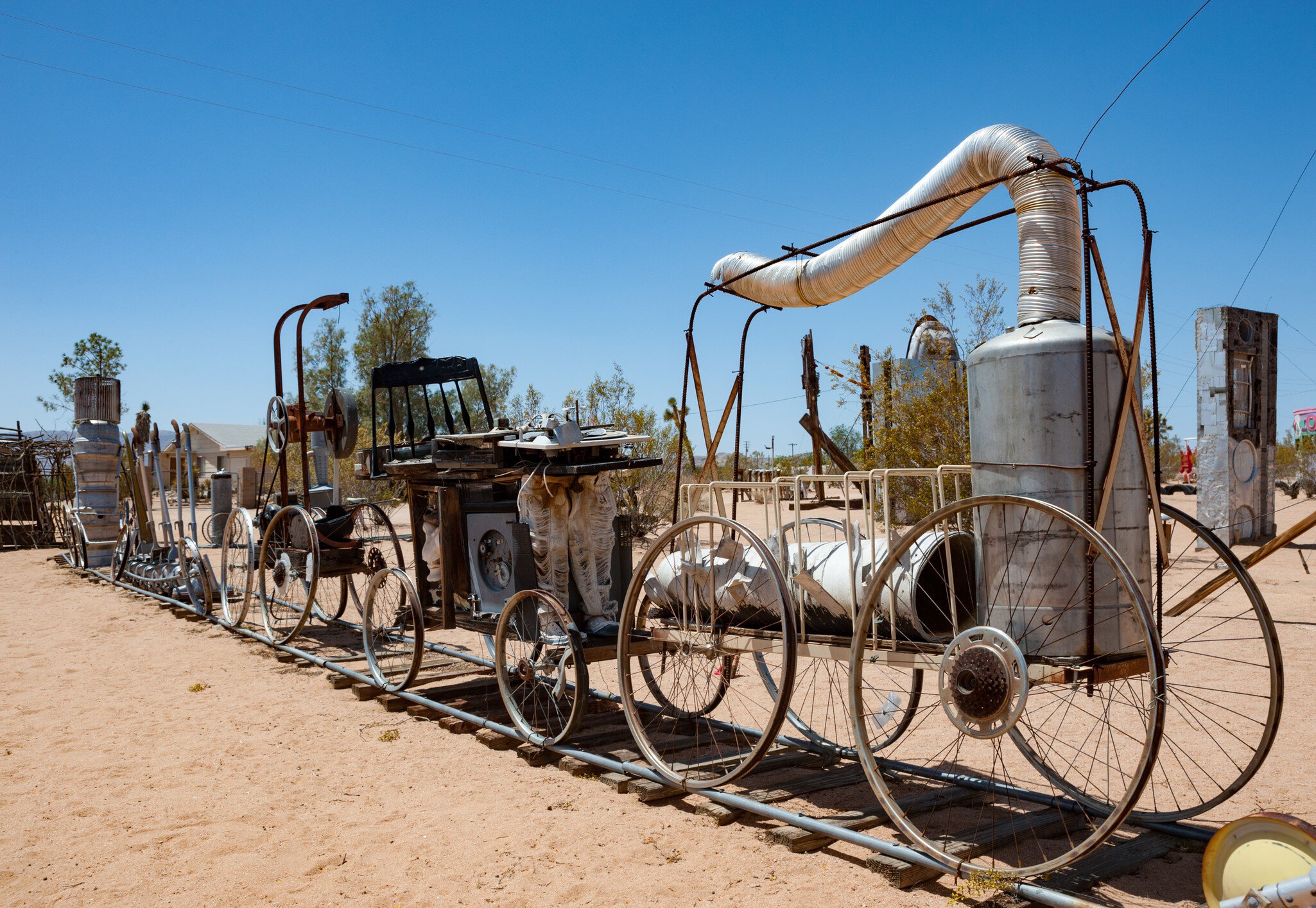 Joshua Tree, California, USA - 28th April, 2013: Noah Purifoy's Outdoor Desert Art Museum of Assemblage Sculpture created in the high desert of Joshua Tree; Shutterstock ID 1248845515; purchase_order: 65050; job: POIs; client: Lonely Planet - digi...