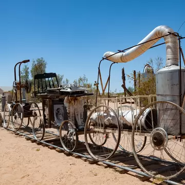 Joshua Tree, California, USA - 28th April, 2013: Noah Purifoy's Outdoor Desert Art Museum of Assemblage Sculpture created in the high desert of Joshua Tree; Shutterstock ID 1248845515; purchase_order: 65050; job: POIs; client: Lonely Planet - digi...