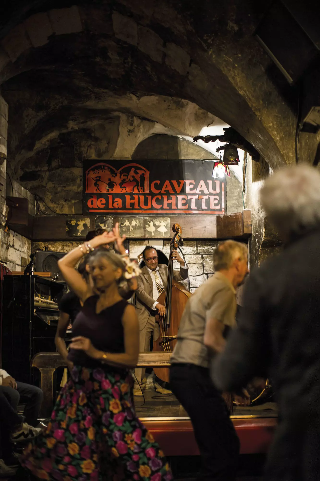 Swing dancers and a band at Caveau de la Huchette, Latin Quarter.