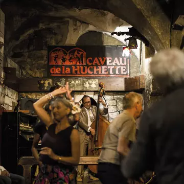 Swing dancers and a band at Caveau de la Huchette, Latin Quarter.