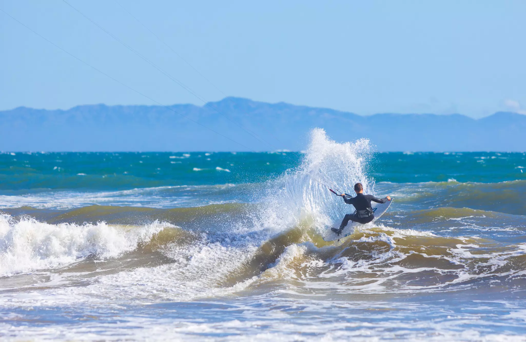 Man kitesurfing at Arroyo Burro Beach, Santa Barbara