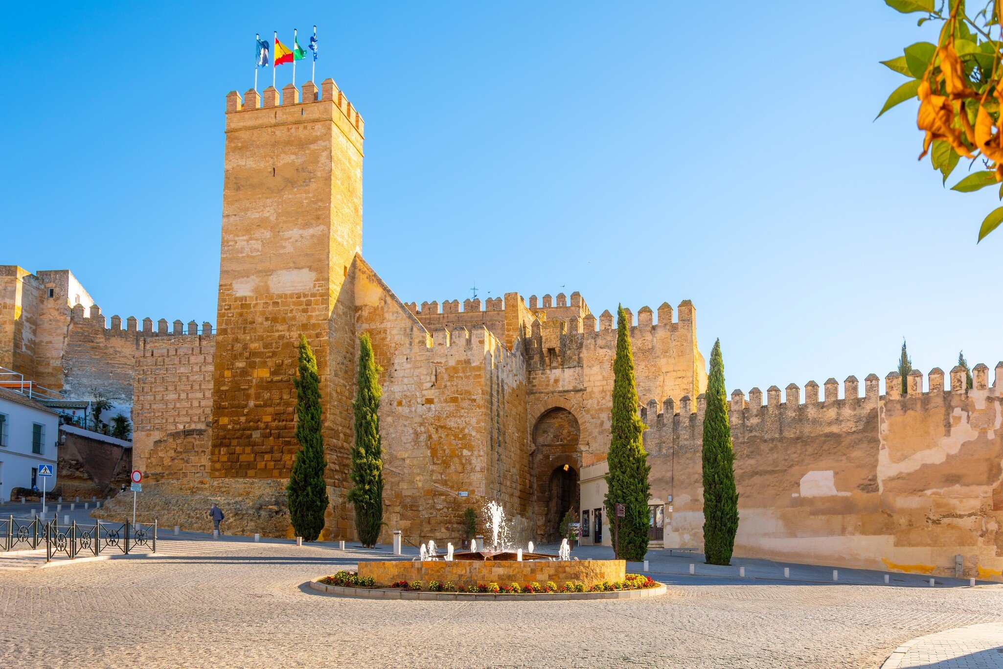 View of the Alcázar de la Puerta de Sevilla, a Moorish castle fortress in the Andalusian town of Carmona, Spain.