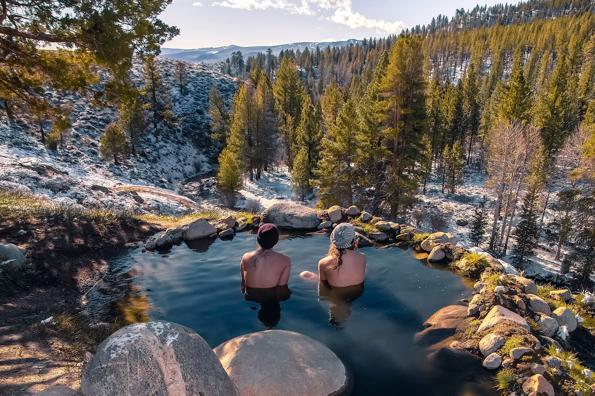 A pool surrounded by mountains