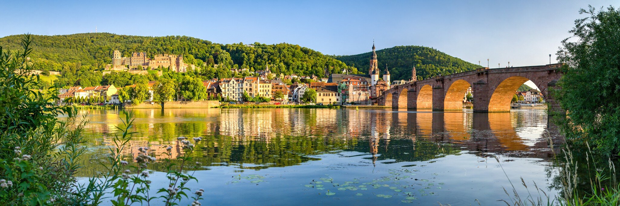 Town of Heidelberg with castle and old bridge in Germany.